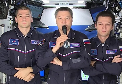 Российский экипаж МКС поздравил россиян с Днем Конституции